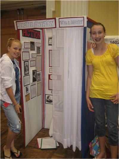 Nicole Pederson and Briana Schwabenbauer with their group exhibit on Susan B. Anthony.